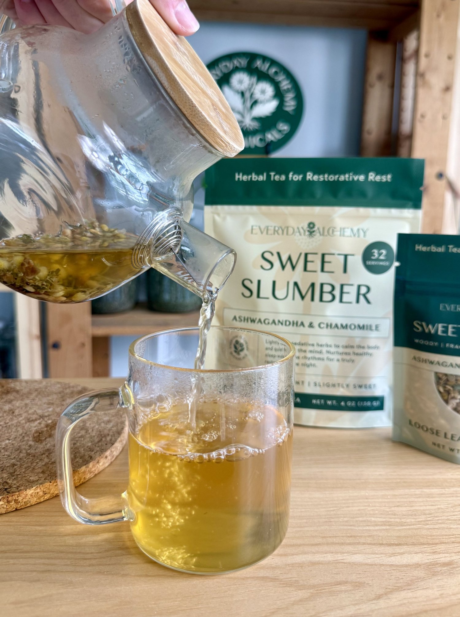 Sweet Slumber tea being poured from a glass pot